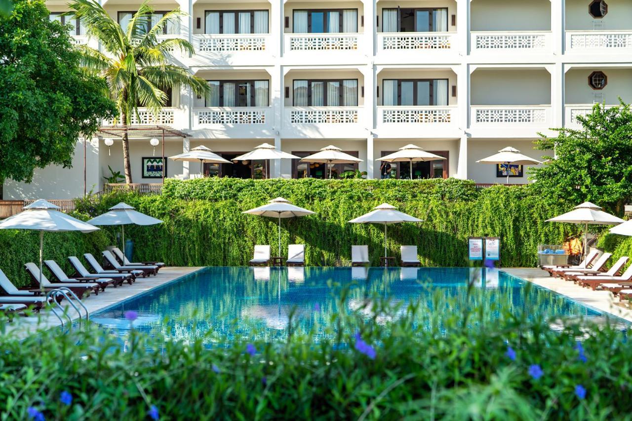Rivertown Hoi An Resort & Spa Esterno foto The hotel's swimming pool