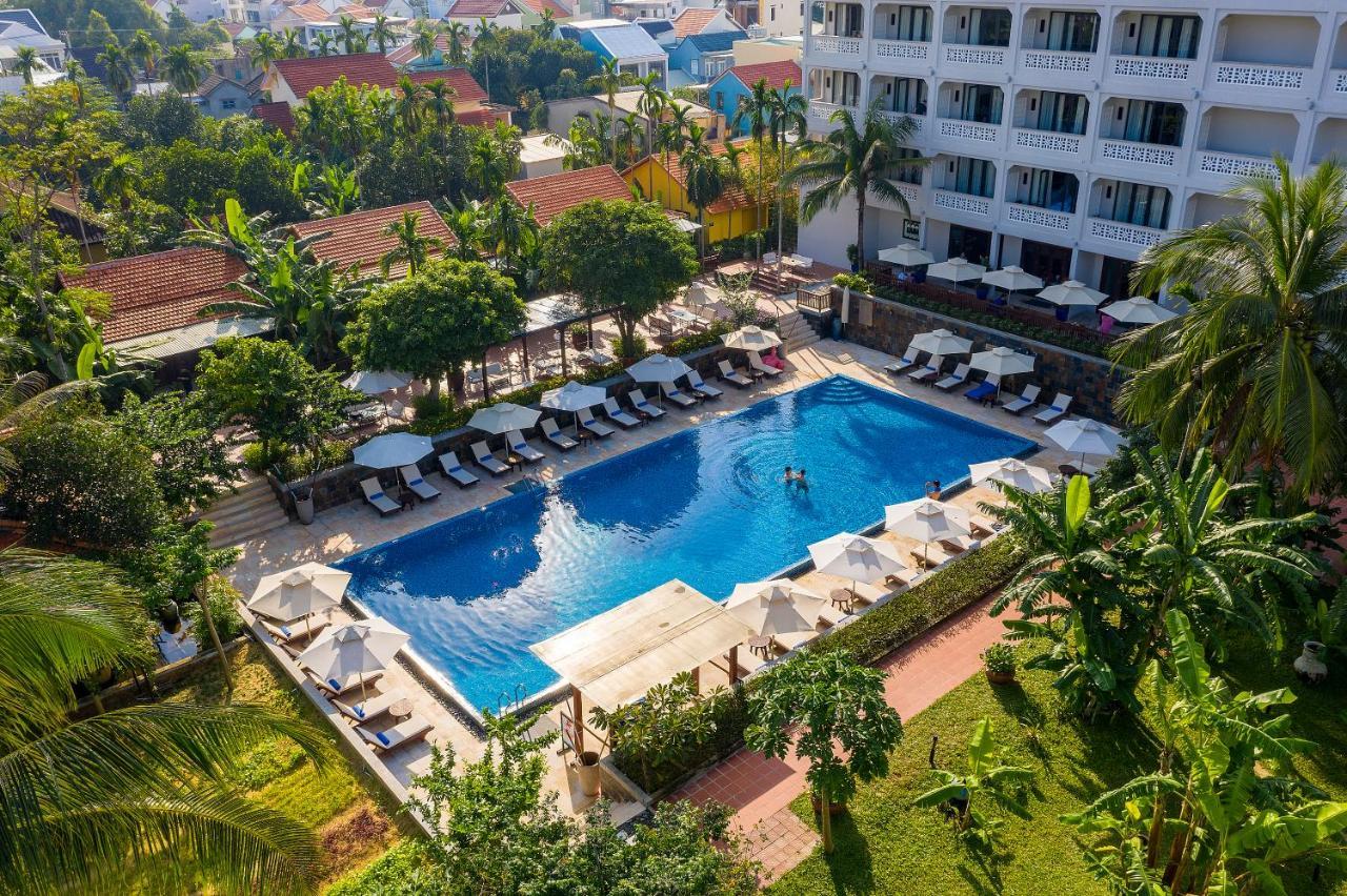 Rivertown Hoi An Resort & Spa Esterno foto The hotel's swimming pool
