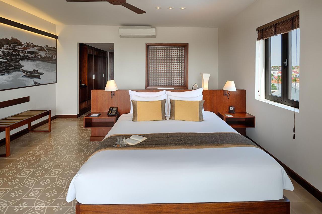 Rivertown Hoi An Resort & Spa Esterno foto A bedroom at the hotel