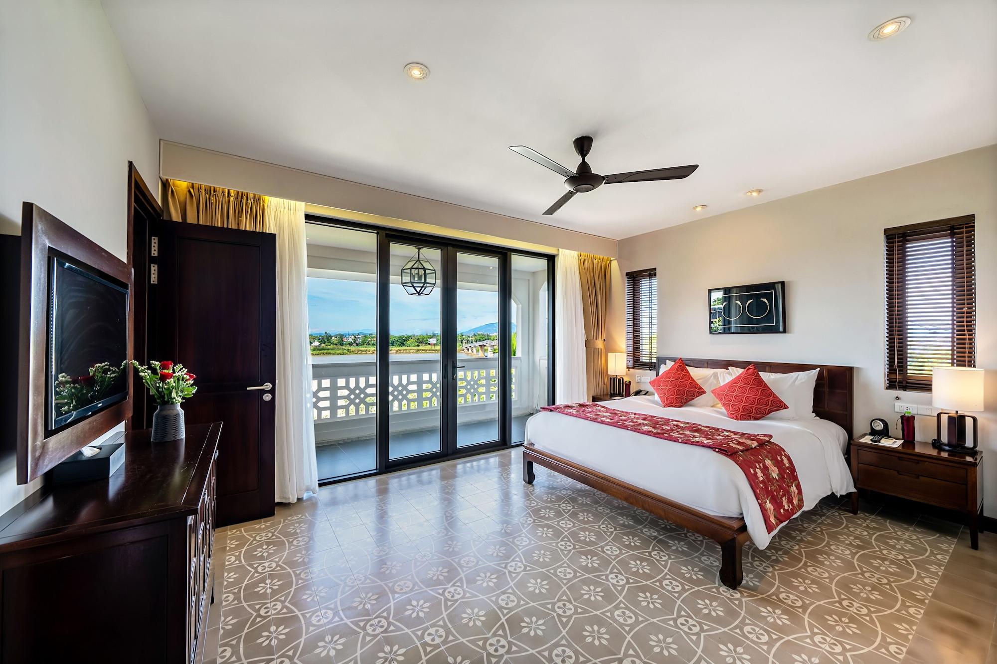 Rivertown Hoi An Resort & Spa Esterno foto A bedroom at the resort