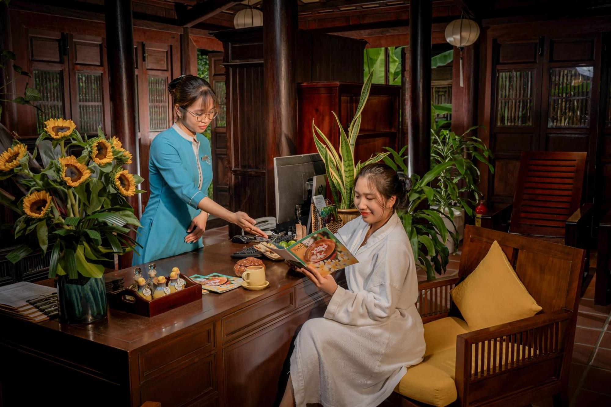 Rivertown Hoi An Resort & Spa Esterno foto Reception at the hotel